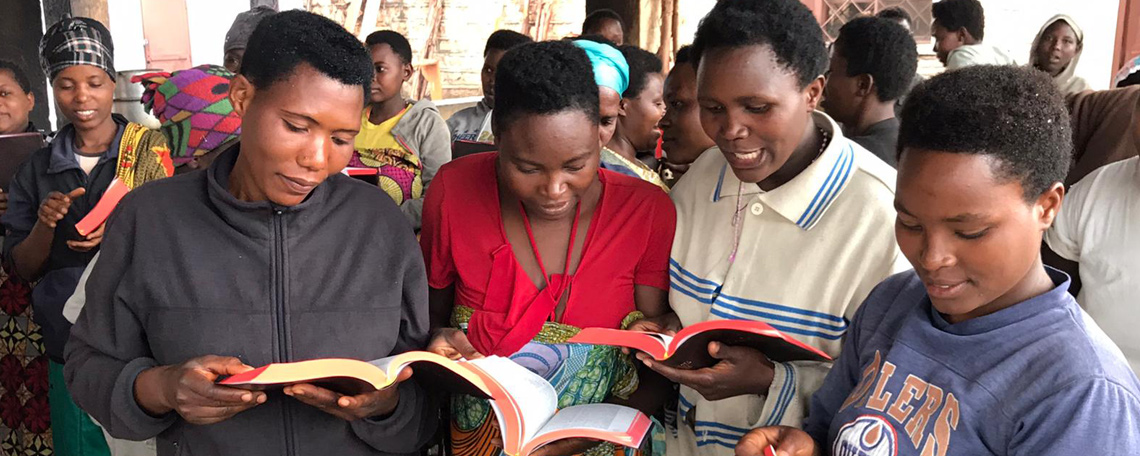4 ladies eagerly read new bibles